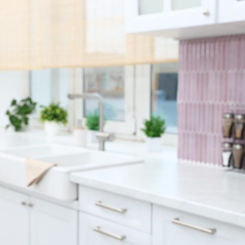 bright-modern-kitchen-interior-with-pink-tiled-bac-2026-06-03-16-33-32-utc