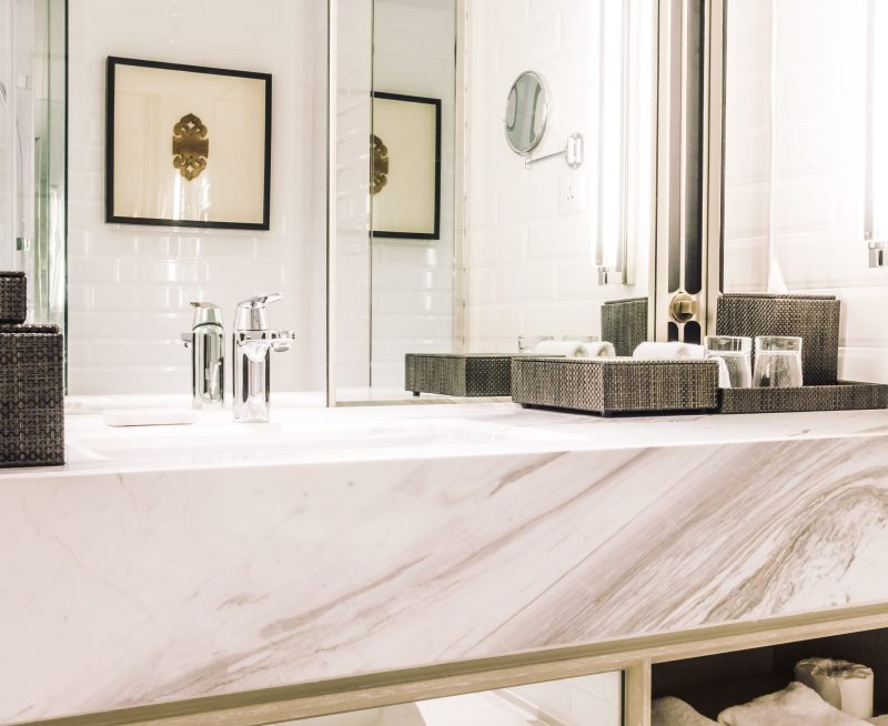 Granite bathroom countertops in a modern home.
